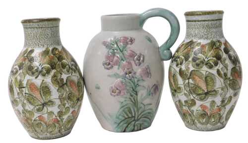 A Bourne Denby Danesby ware pottery jug, relief decorated with pink flowers, and a printed mark,...