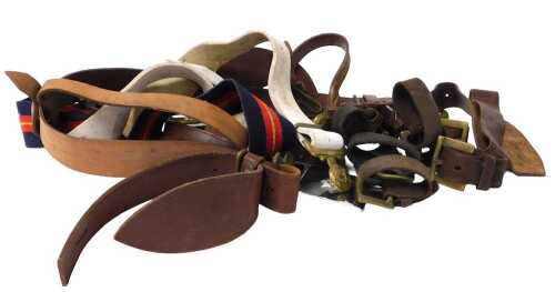 Three military belts, including the Royal Anglian Regiment, together with a Boys Brigade belt,...