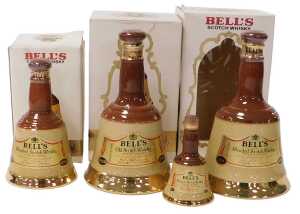 Four Bell's Scotch whisky decanters, comprising 37.5cl (x2), 18.75cl, all boxed, and a further...