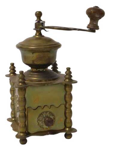 A 20thC Dutch brass coffee grinder, with a single frieze drawer, raised on a serpentine base, on...