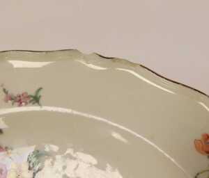 An 18thC Chelsea red anchor period plate, painted in Deutche Blumen floral sprays, mark to... - 2