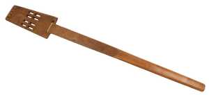 An early 20thC Albanian carved wooden shepherd's distaff, with geometric carving, 83.5cm high.