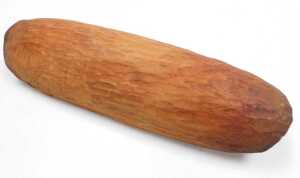 An Austrian cow bell, and a wooden carved bowl, possibly Australian Aboriginal, 47cm wide. (2) - 3