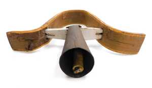 An Austrian cow bell, and a wooden carved bowl, possibly Australian Aboriginal, 47cm wide. (2) - 4