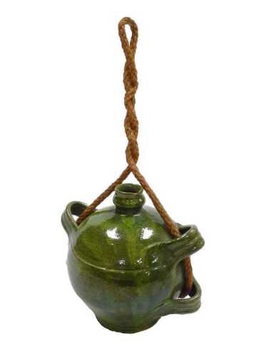 A 19thC French Provincial green glaze pottery conscience jug, green glazed, with four loop...