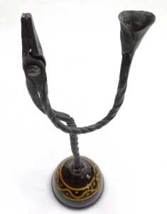 A late 18thC wrought iron rush light candle holder, raised on a brown domed slipware base, 36cm... - 2