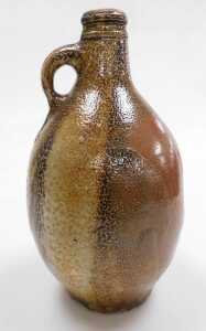 An 18thC German brown salt glazed stoneware Bellarmine flagon, 30cm high. - 2