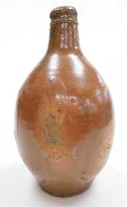 An 18thC German brown salt glazed stoneware Bellarmine flagon, 30cm high. - 3