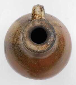 An 18thC German brown salt glazed stoneware Bellarmine flagon, 30cm high. - 4