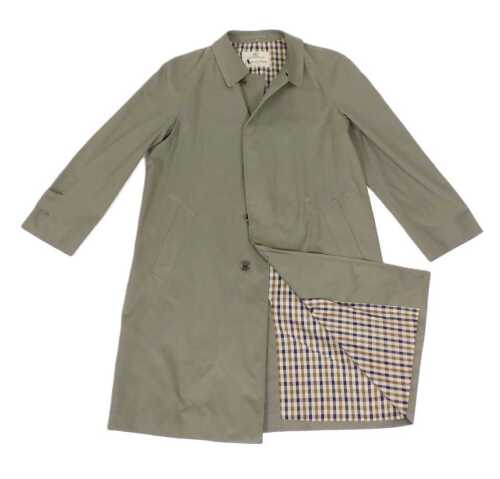 An Aquascutum pale grey trench coat, with tartan lining, underarm measurement approx 57cm.