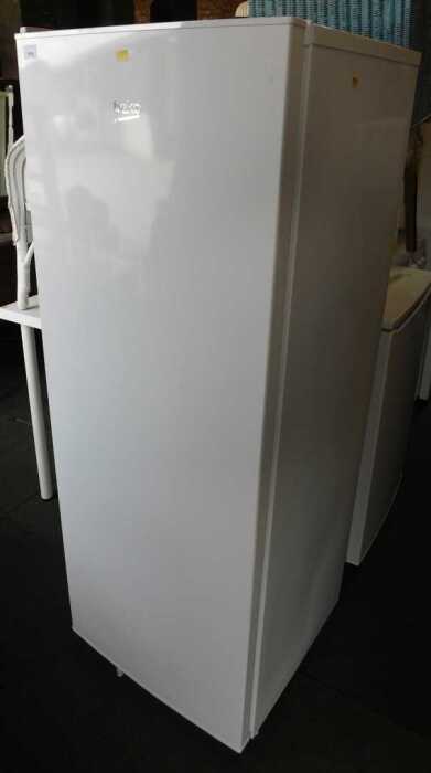 A Beko upright freezer, in white.