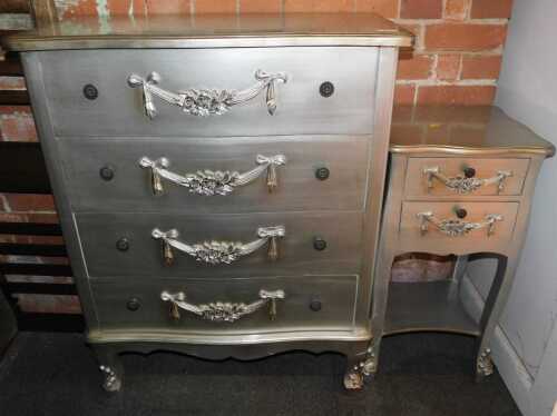 A four drawer silver painted chest, raised on carved legs, and a matching two drawer bedside...