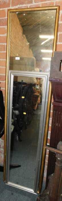 A gilt-framed rectangular hall mirror, and a rectangular silver-framed mirror. (2)