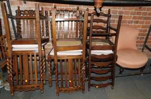 Six various oak dining chairs, and a Victorian nursing chair, upholstered in pink fabric. (7)