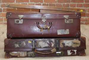 Two suitcases, together with a deckchair foot rest. (3)