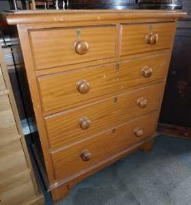 A Victorian scumbled pine chest of two short over three long drawers, on bracket feet, 109cm...