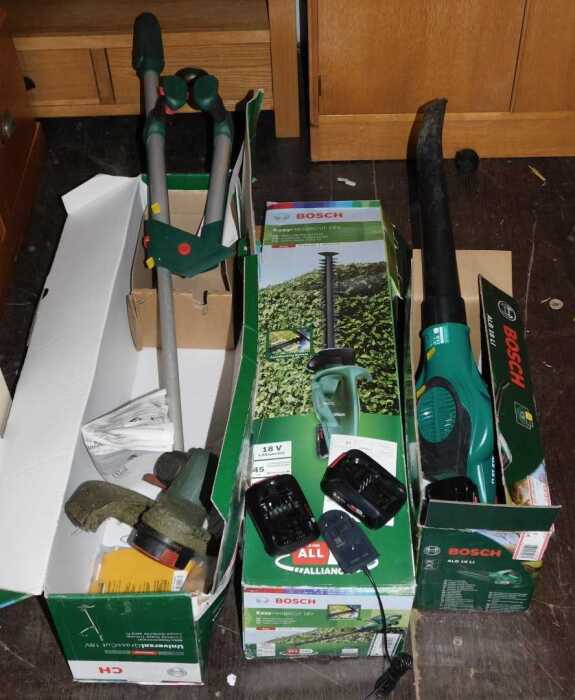Bosch cordless garden tools, comprising a hedge cutter, strimmer and a leaf blower. (3)