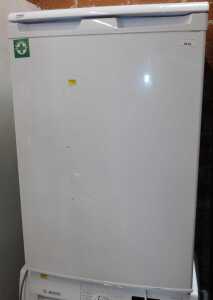 A Beko undercounter fridge, in white.