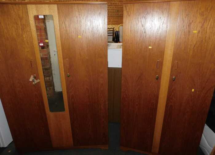 Two Leibus wardrobes, both twin door, one with mirror to front.