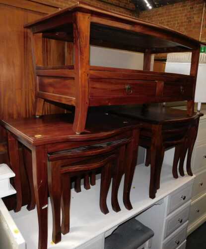 Two Ancient Mariner nests of three hardwood tables, and a matching coffee table with tier below...