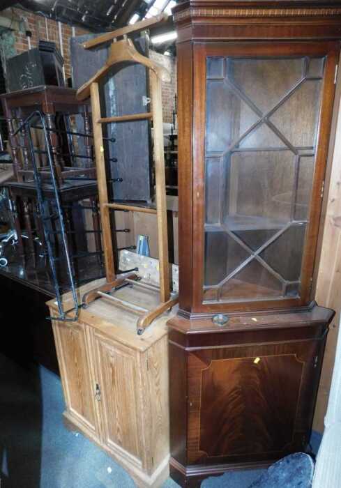 Furniture, comprising a WorkMate, a small pine two door cupboard, a corner cabinet, a suit...