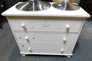 A white painted pine three-drawer chest, raised on bracket feet. (AF)