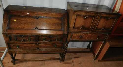 An oak cocktail cabinet with lift lid over two folding doors over single drawer, raised on...