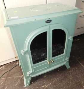 A green metal coal effect electric stove.