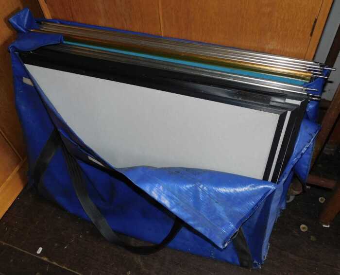 Two folding display boards, in PVC bags.