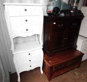 Furniture, comprising a hall cupboard, with two drawers over two panelled doors, raised on...