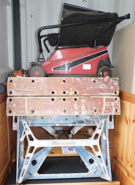 A Black and Decker Workmate, together with a Mountfield Princess electric lawnmower. (2)