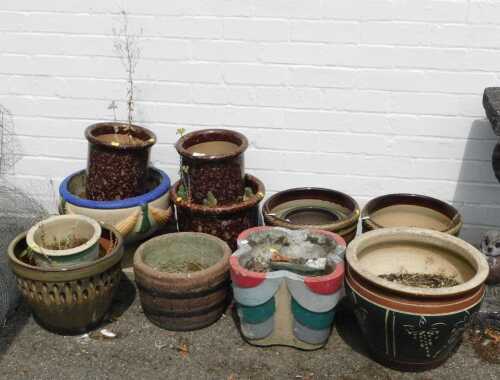 Twelve ceramic garden planters, of various forms, shapes and sizes.