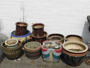Twelve ceramic garden planters, of various forms, shapes and sizes.