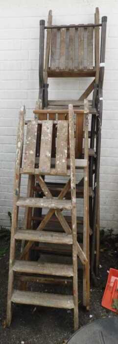 Ladders, comprising a wooden A frame ladder, set of metal and wooden A frame ladders, and two...