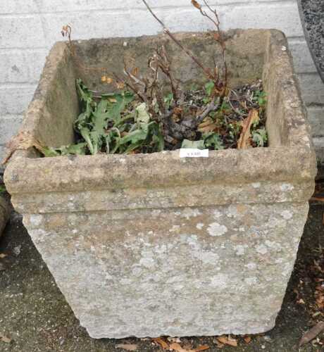A square concrete planter.