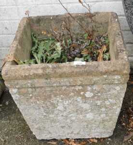 A square concrete planter.