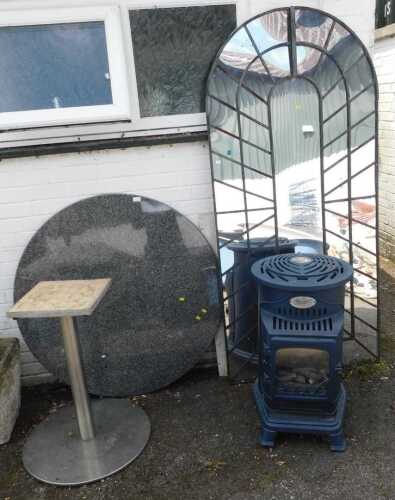 A granite topped circular garden table, with white metal finish base, a large garden mirror, and...