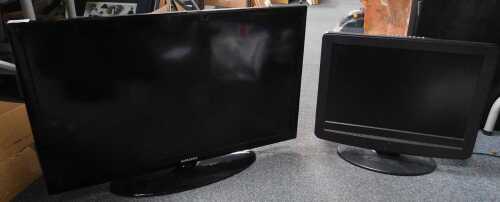 A Samsung flat screen TV, model number UE32D4003VW, and another smaller, with remote.