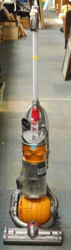 A Dyson DC24 upright vacuum cleaner.
