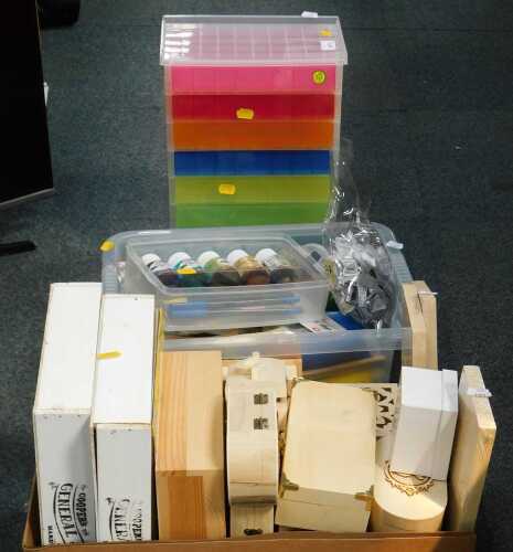 Craft materials, including paints, craft storage boxes, etc. (3 boxes, under 1 table)