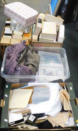 A quantity of gift boxes, together with clothing, stationery, mixed textiles, etc. (contents...