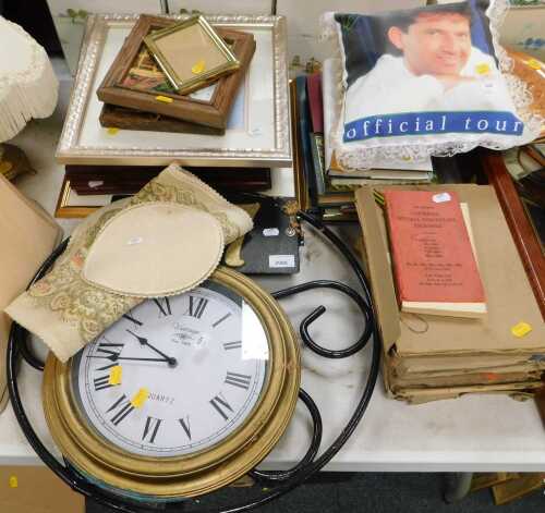 Pictures, prints and books, to include a small table mat, a wall clock with Roman numerals to...
