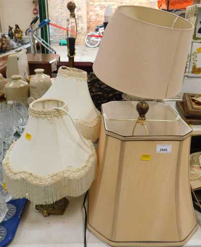 Five lamps and four lamp shades.