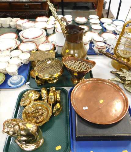 Metalware, to include a large brass water jug with handle, a copper charger or tray, copper...