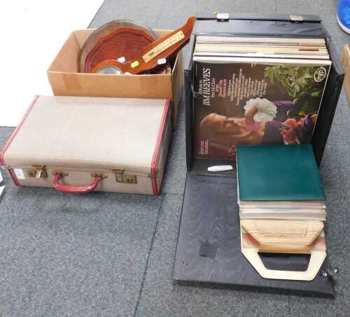 Household items, comprising an aneroid barometer, a small occasional table, a case containing...