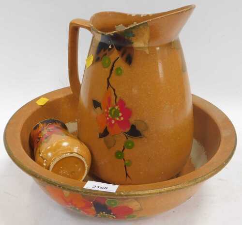 A jug and wash set, decorated with flowers. (1 shelf)