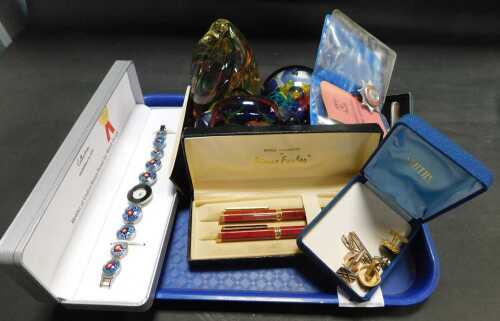 Three glass paperweights, together with a Marcel Drucker wristwatch, a Derbyshire Fire Service...