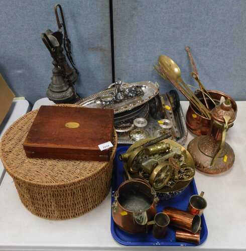 Metalware, to include an Eastern ewer, copper vessel, pair of spelter ewers, on black socle...