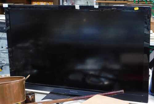 A Panasonic Viera 42" television, model number TX-L42E30B, with lead.