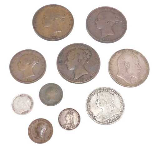 Coins. A Victorian 1884 penny, another 1854, 1896 florin, various other low denomination,...